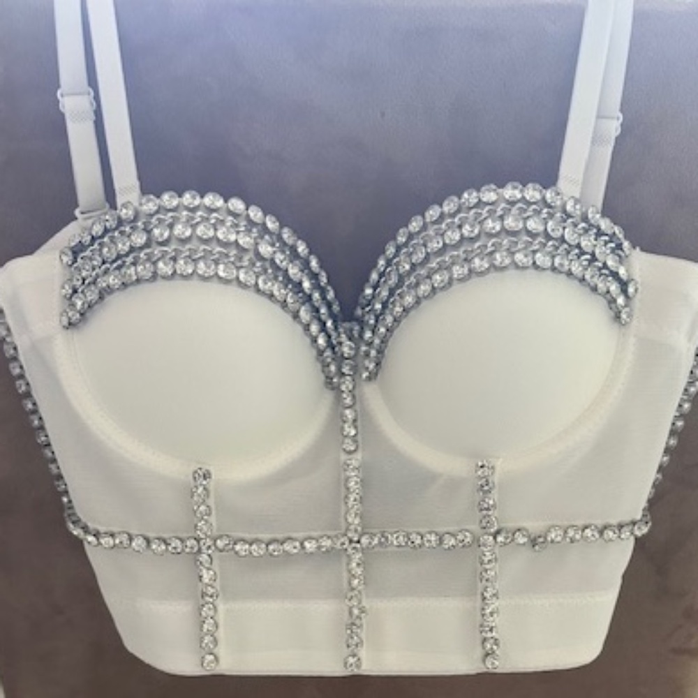 Up for sale is a NWOT white style bustier size small